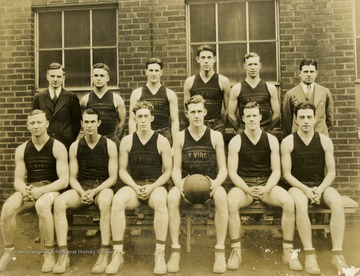 Print number 23. Standing (from left to right): Schrader, student manager; Parriott, Baker, Gerringer, Riley, Coach Stadsvold. Seated (from left to right): Sortet, Cubbons, Bartrug, Captain Plaster, Doyle, Weiner.
