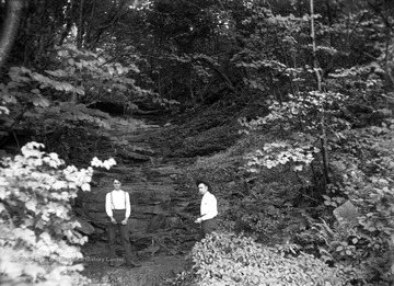 Two men are likely members of the Green family, location is unidentified.