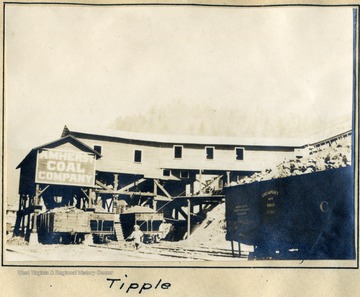 The tipple of a coal mine with the sign that reads "Amherst Coal Company."