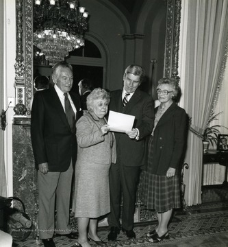 Senator John Warner is the man second from right and Helen Holt is the woman on the right.