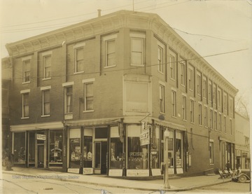 Street view of the building located on the corner of Temple Street and 3rd Avenue. The building burned in 1983 and is now Towne Square. 