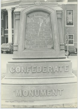 Close up of the monument, which reads, "This monument erected in honor of American valor as displayed by the Confederate soldiers from 1861 to 1865, and to perpetuate to remotest ages the patriotism and fidelity to principles of the heroes who fought and died for a lost cause."