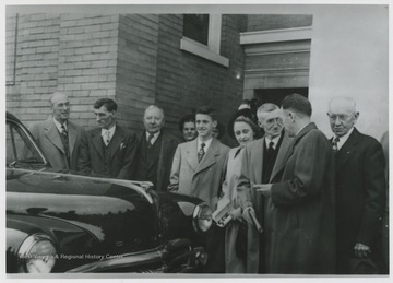 Pictured left to right is Art Lough, unidentified, Cecil Lively, Evelyn Bigony, Dick Hackney, Elma Hackney, Paris Hackey, Clair Bigony, M. H. Maloney, and Luther Wheeler. 