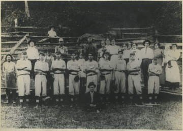 Baseball players and their fans pose for the team portrait. Subjects unidentified. 