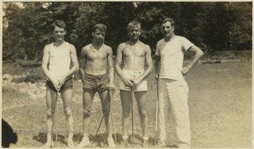 Garrity, pictured at far right, with three unidentified campers. The camp became "Camp Summers" in 1985. 