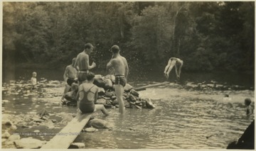 Campers spend their free time by the water. The camp later became "Camp Summers" in 1985.