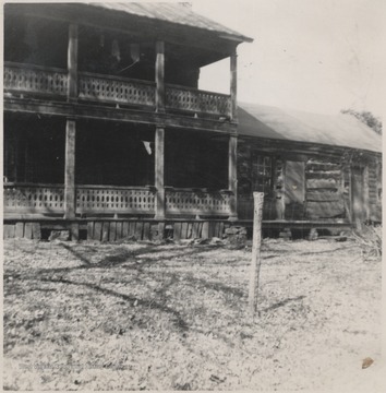 The original cabin, to the right, and a grand addition, on the left, are pictured. The Hutchinson family was the earliest settling family in the Forest Hill District near the Greenbrier River. 