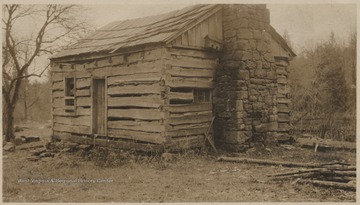 Picture of an old log home. 