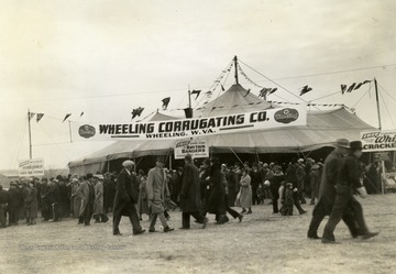 The Rhythm Rangers were radio stars on the "It's Wheeling Steel" radio broadcast, which was created in 1936 by Wheeling Steel Corporation advertising executive John L. Grimes. The radio broadcast was ran and operated by company employees and family members, the first of it's kind to utilize this model. This free, live performance, at the National Cornhusking Championship in Marshall, Missouri was a way to advertise the broadcast to a broader audience as well as to promote their products to farmers in the area.