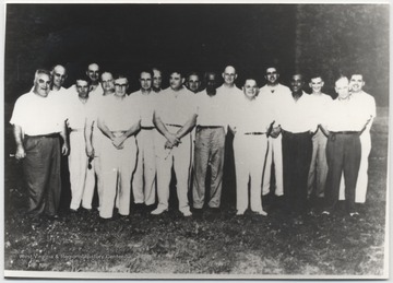 Supervisors and clerks gather for a group photo. Pictured, from left to right, is Tony Young, Earl Meador, Charley Young, Ernest Hunter, Herb Comer, Bill Fitzsimmons, Hobson Marks, Ben Hamer, V. V. Viars (master mechanic), Bill Tyree, I. E. Gore, Jake Miller, M. T. Llewellyn, Andy Hopkins, Jess Gore (laborer), Earl Bleay, Mervin Shull, and A. J. McAllister. 