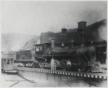 Stoddard family pictured beside the turntable, which was 900 feet in circumference. 