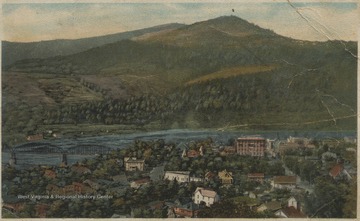 Drawn, colored depiction of the city set beside New River.Postcard postmarked January 22, 1933 was published by Dolin Bros. of Hinton, W. Va. See original for correspondence. 