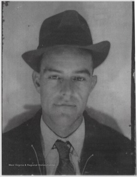 Meador wearing a hat and jacket.