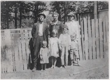 Front row, from left to right, is Piney M. Lilly, Grace B. Lilly, Ernest L. Lilly, and Edward P. Lilly.Pictured in the back row is Thomas W. Lilly, Mary E. Lilly, and her son, Blake Farley.