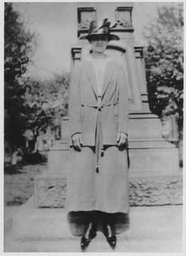 Johnson stands in front of the monument located right outside the courthouse.