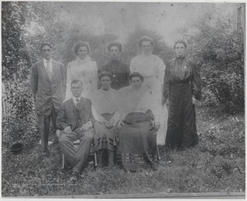 Family of James L. & Mary E. Lilly gathered for a group photo. Seated from left to right is James Lewis Lilly, Margaret E. Lilly, and Mary E. Walthall Lilly. Standing is Walter T. Lilly, Verlie Lilly Taylor, Nellie Lilly Pitzer, Ollie Lilly and Josie Lilly Dennis.