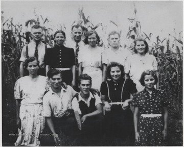 Children of Jefferson L. "Bun" and Mary Lilly. In the back row, from left to right, is Floyd, Lena (Oakley), Prince, Orpha, Beecher, and Margaret. Bottom row is Nola, Oris, Granvil, Cosby, and Clarice. Oldest son, Oliver, is not pictured.