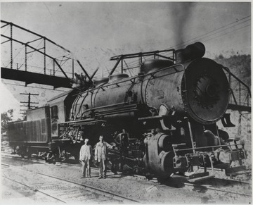 Mr. Harris pictured on the right, directly next to the engine.