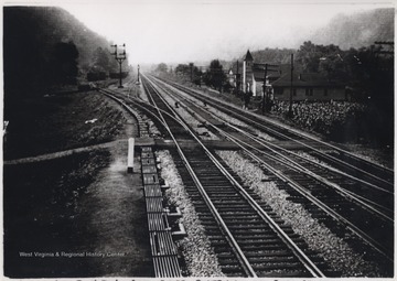 Looking east from the M. D. Tower at the center of the passing track. On the west-bound is a pull-off track and connections on the left to the Nicholas, Fayette, and Greenbrier Railway.