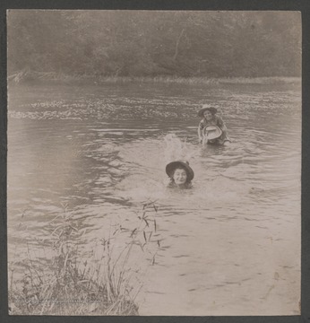"Daisy" Miller Gooch pictured in the fore ground splashing. The girls are relatives of James H. Miller.