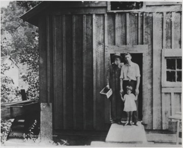 From left to right is Thomas Moody Cooper, owner of Cooper's Mill from 1895-1945; Roy Ellison, husband of Audrey Wills; Elenite, Roy and Audrey Ellison's daughter who later became Mrs. Milton B. Wise.