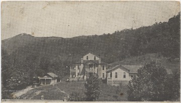 Drawn depiction of the grand hotel building located along the C. & O. Railroad.Published by E. G. White of Ronceverte, W. Va.