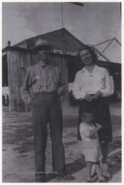 Thomas Lilly (born June 11, 1885) stands next to Grace Blanche Lilly Meador Hatcher (born in 1919) and a young Robert Cecil Meador (born 1942).