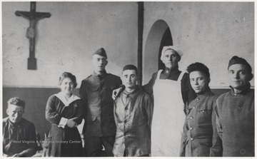 Joseph J. Richmond, the uncle of Macie Fox, sends a photo of himself alongside German associates to relatives back in the United States. 