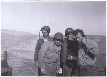 Van A. Trail of Summers County, W. Va. is pictured with comrades on a battleship during what is also known as the Asia-Pacific War.