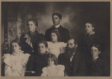 Pictured is Silas and M. J. Hinton withe their children Arthur, Blanch, Howard, Grace, Ethel, Carl, Gladys, and Lucile. Grace was the first baby born in Hinton. Arthuer was the first burial at Hilltop Cemetery. 