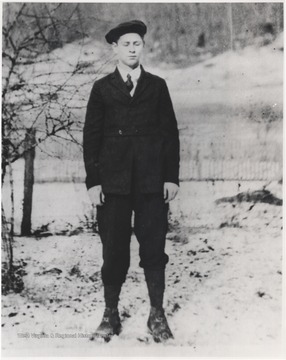 A young Neely pictured in a snow-covered field.