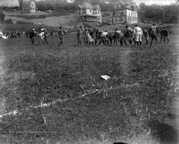 The W.V.U. football team plays against Geneva at a game in Morgantown, W. Va. in October of 1896