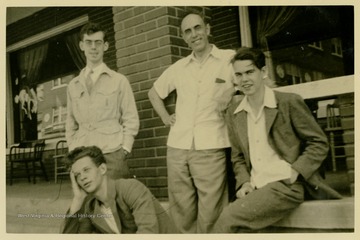 Five members of the Madrigal Singers of Clarksburg group pose for a portrait in Los, Angeles, CA at the National Federation Music Clubs.Established in 1938, the Madrigal Singers of Clarksburg have been performing for more than 75 years.  During the 1940's through the 1970's, Bill James directed the group. E.W. "Bill" James wrote "My Home Among the Hills" for the West Virginia Centennial among other musical compositions.  The madrigal group performs some recent music, but primarily sings music dating from the English Renaissance while wearing period clothing.