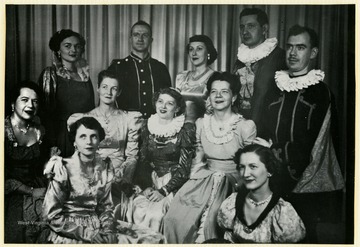 Established in 1938, the Madrigal Singers of Clarksburg have been performing for more than 75 years.  During the 1940's through the 1970's, Bill James directed the group. E.W. "Bill" James wrote "My Home Among the Hills" for the West Virginia Centennial among other musical compositions.  The madrigal group performs some recent music, but primarily sings music dating from the English Renaissance while wearing period clothing.