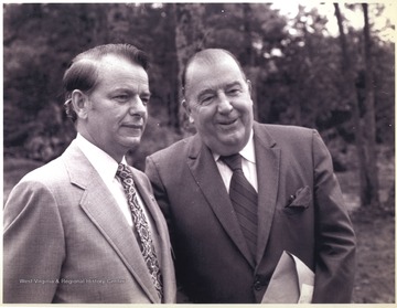 Senator Byrd, left, and Randolph, right, are pictured together, looking away from the camera, at the dedication ceremony for the new Mining School with the Mine Enforcement and Safety Administration, or MESA.