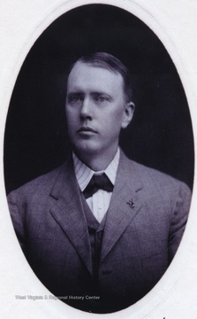 Miller is pictured in an oval-shaped portrait.