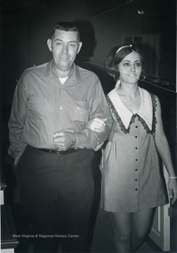 Bill Sirk escorting his daughter, Judy, down the aisle during Judy's wedding rehearsal.