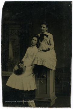 Portrait of Sadie West and Nancy Lauck from a from a photograph album of late nineteenth century images featuring residents from Keyser, W. Va.