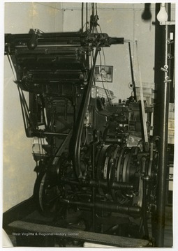 A linotype machine used when printing newspapers at the Wirt County Journal in Elizabeth, W. Va.The photos in this collection were used in chapters that appeared in Mountain Trace, a publication of Parkersburg High School in West Virginia, edited by Kenneth G. Gilbert.