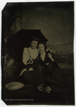 Portrait of Nancy Lauck and Katie Fitzer from a photograph album of late nineteenth century images featuring residents of Keyser, W. Va.