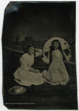 Portrait of Edith Woodcock (on the right) and an unidentified girl from a photograph album of late nineteenth century images featuring residents from Keyser, W. Va.