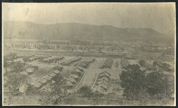 View of homes and factories in Nitro, a town created during WWI in 1917 to produce gunpowder for the war effort. The gunpowder factories are visible in the distance.