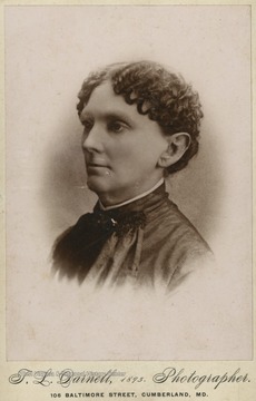 The photo of Mrs. Johnson taken in Cumberland, Md. is from a photograph album of late nineteenth century images featuring residents from Keyser, W. Va.
