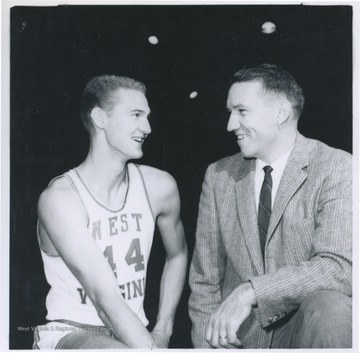 West, left, and Schaus, right, are pictured together smiling. 