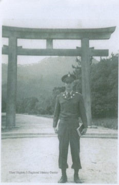 West is pictured in front of a Japanese structure after he has made a recovery from hepatitis.  He was the older brother of basketball star Jerry West. David was awarded the Bronze Star for meritorious service after dragging a fellow soldier from a rice paddy after he was hit. David died in the Korean War at age 22 when Jerry was 12.
