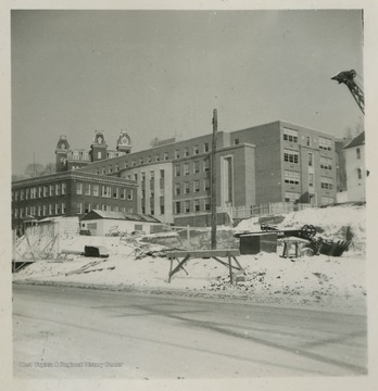 Armstrong Hall is pictured with Woodburn Hall behind it and the Medical School in the foreground during the winter.