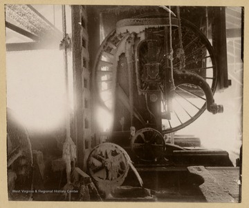 A bandsaw used to saw Spruce and Hemlock, frozen during winter.This image is part of the Thompson Family of Canaan Valley Collection. The Thompson family played a large role in the timber industry of Tucker County during the 1800s, and later prospered in the region as farmers, business owners, and prominent members of the Canaan Valley community.