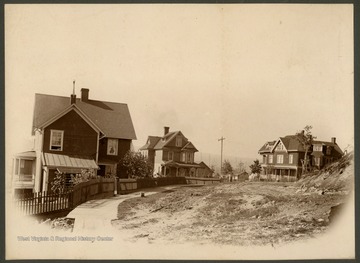 From left to right is the C. I. Pell House (later Robert T. Barton's home), the company House of Beech Burgen, the F. S. Landstreet House, and the Allegheny Heights Hospital, later the site of the Coffman House.This image is part of the Thompson Family of Canaan Valley Collection. The Thompson family played a large role in the timber industry of Tucker County during the 1800s, and later prospered in the region as farmers, business owners, and prominent members of the Canaan Valley community.