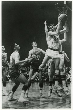 West scores a rebound in a Southern Conference tournament against The Citadel. WVU won this game 85-66.