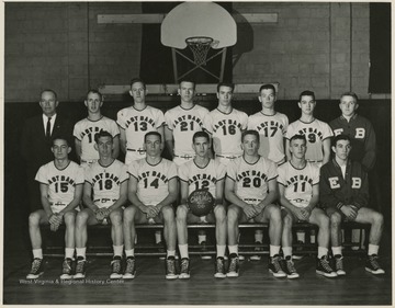 Jerry West attended East Bank High School before moving on to West Virginia University, where he continued his basketball career.West led his team to its first ever state championship title as the starting small forward. He was named All-State from 1953–56, then All-American in 1956 when he was West Virginia Player of the Year, becoming the state's first high-school player to score more than 900 points in a season.West was born in Cheylan, W. Va. in 1938. After high school, he went on to play basketball for West Virginia University and then rose to fame as a player for the Los Angeles Lakers of the NBA before becoming a basketball coach and manager. West was born in Cheylan, W. Va. in 1938 and rose to fame as a player for the Los Angeles Lakers of the NBA before becoming a basketball coach and manager. 